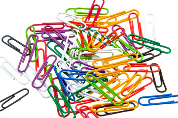 Color paper clips to background. Isolated on white