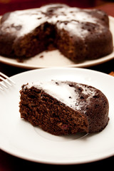 chocolate cake with icing sugar