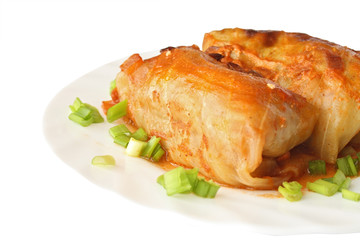 cabbage rolls in tomato sauce on plate