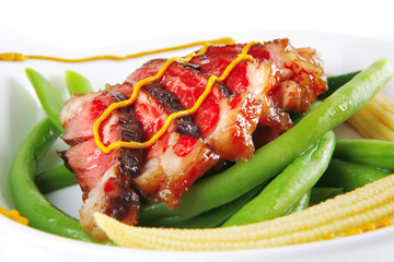 roast meat served on plate