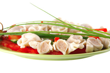 fresh boiled dumplings on green