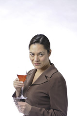 Side view of lady holding a glass of wine