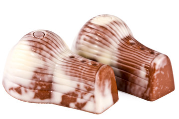 Pair of chocolates close up isolated