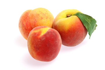 Fototapeta na wymiar Fresh fruit - Peaches isolated on white background