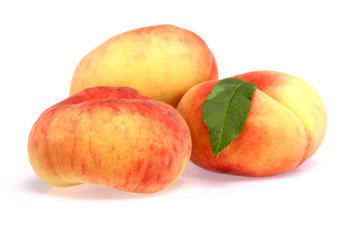 Peaches isolated on white background