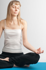 young woman doing yoga