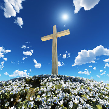 cross surrounded by flowers