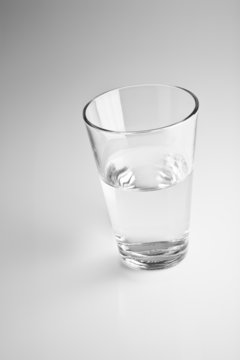 glass on a blurry gray background