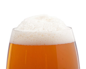 Top of the glass with beer foam