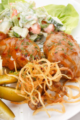 Meat plate with potatoes.