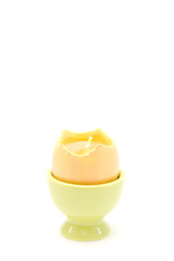 egg candle in eggcup isolated on white