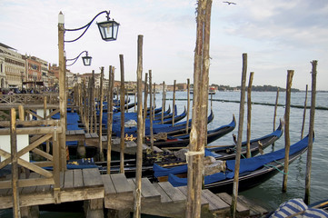 gondola and small pier in Venice, Italy