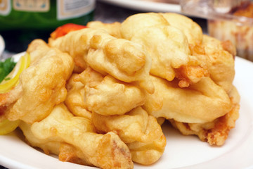 Roast fish in dough on a plate