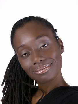 Attractive young black woman tilted head portrait