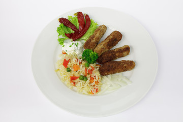 Cevapcici mit Djuvec - Reis
