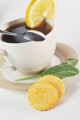 cup of tea with  pastry