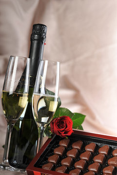 champagne and red rose