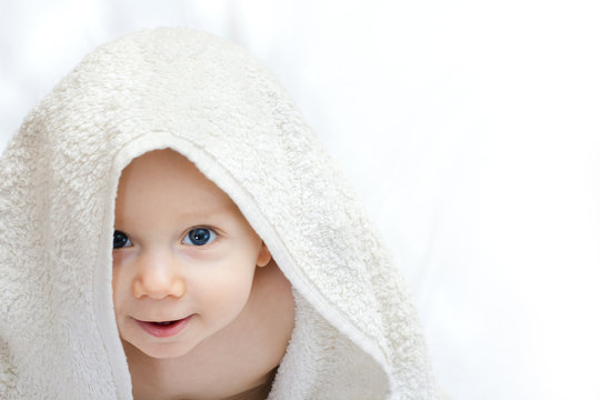 baby portrait with towel