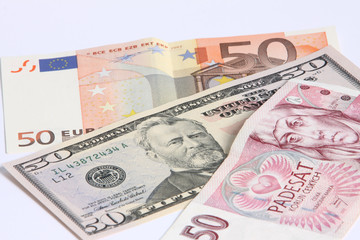 paper moneys - 50 dollar,  50 euro and 50 Korun
