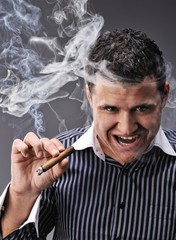 Portrait of a man smoking cigar
