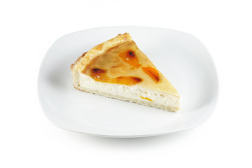 Piece of cake on white plate