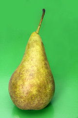 Pear on a green background