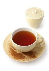Cup of tea and sugar bowl