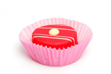 pink petit four over white background