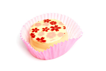 Delicious petit four over white background