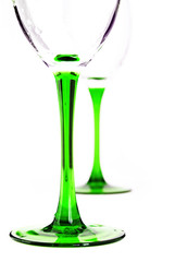 two wine glasses on a colored leg