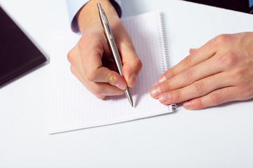 businessman's hand with pen