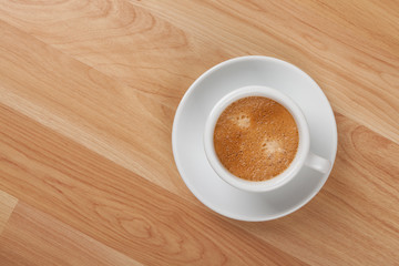 Espresso cup on wood table
