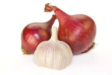 Purple onion and garlic isolated on white