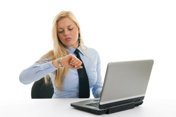 Anxious businesswomen checking time