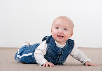 Fototapeta premium crawling baby girl