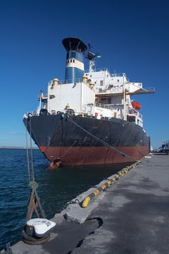 A cargo ship docked in the port