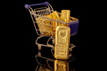 Goldbarren im Einkaufswagen