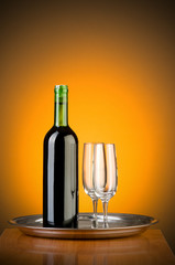 Wine against colour gradient background