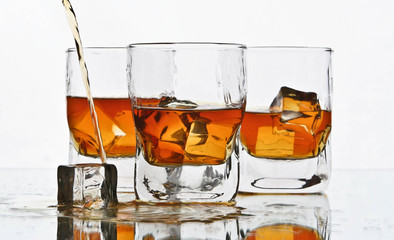 pouring whiskey in bar