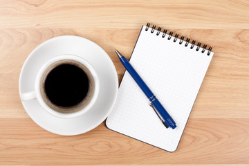 Espresso cup with blank notepad and pen