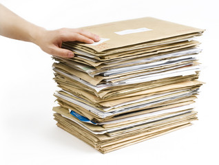 File Stack and hand close up shot on white background