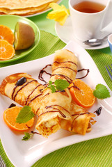 rolled pancakes with  cottage cheese and orange