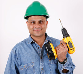 construction worker with cordless drill