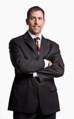 Businessman smiling with arms crossed