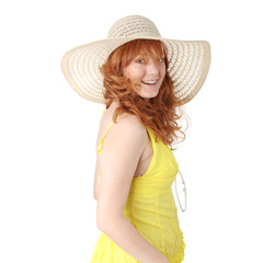 Redhead girl in yellow summer dress