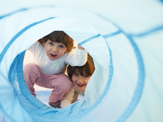 two little girls playing in kindergarten