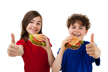 Kids eating healthy sandwiches showing Ok sign