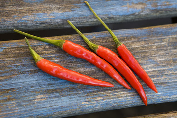 Red  chillies  on wooden blue  table