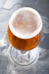 Glass with beer and foam