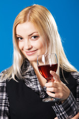 Young woman with a glass of red wine